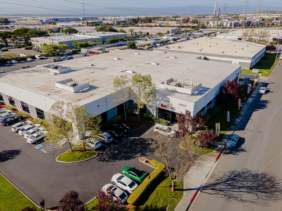 Aerial view of a ZMC Cabinetry showroom and warehouse building